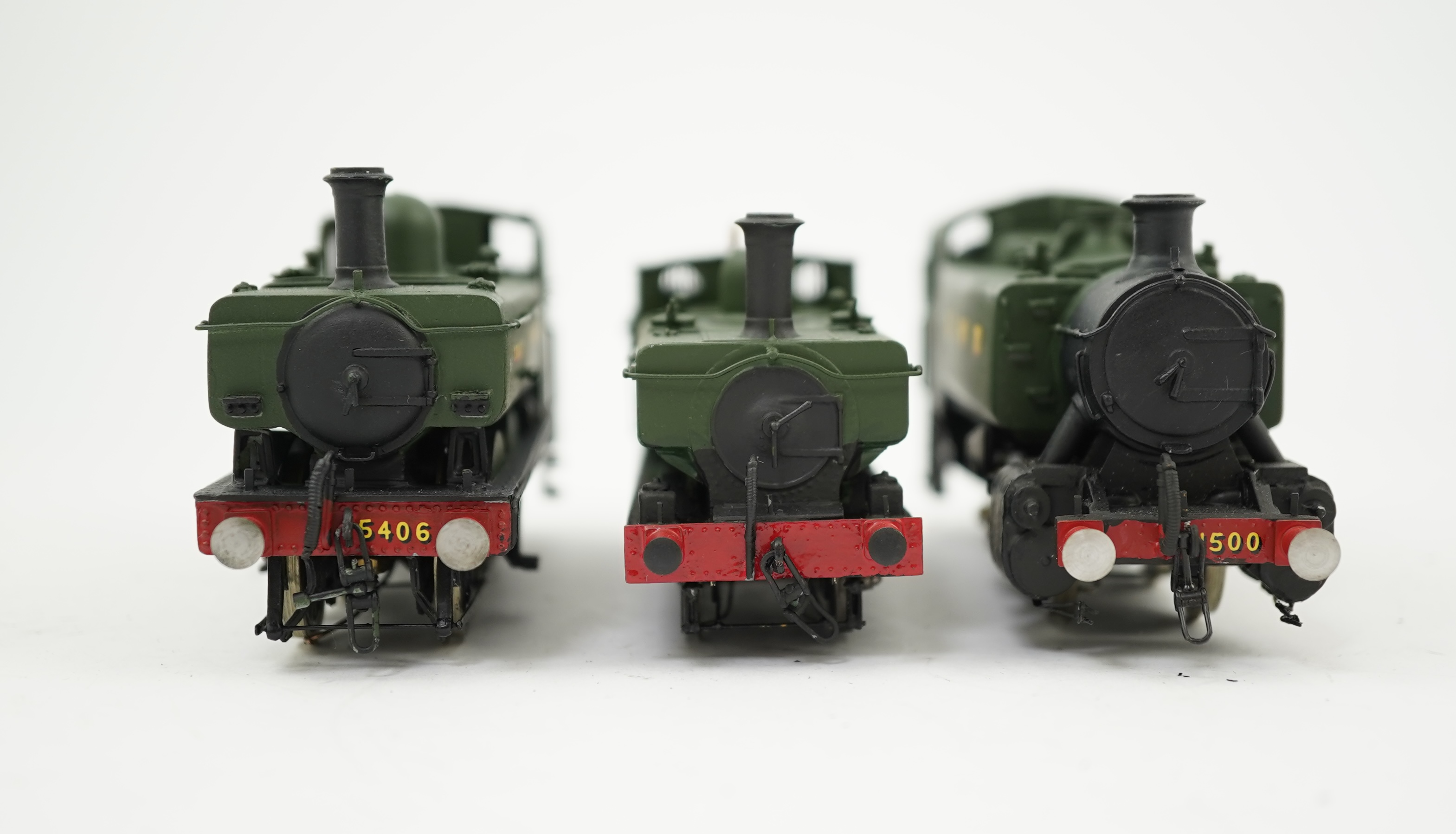 Three 00 gauge brass and white metal kit built GWR tank locomotives; a 15xx class 0-6-0T, 1500, together with an 54xx class 0-6-0PT, 5406, and a 19xx class 0-6-0PT, 1925, all constructed, painted and lined to a high stan